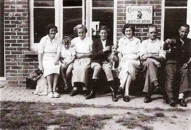 Outside the front of The Royal Oak, 1949 Landlord Fred Aspin (2nd from r), his wife Phyllis (3rd from r) and their daughter Aline (4th from r)